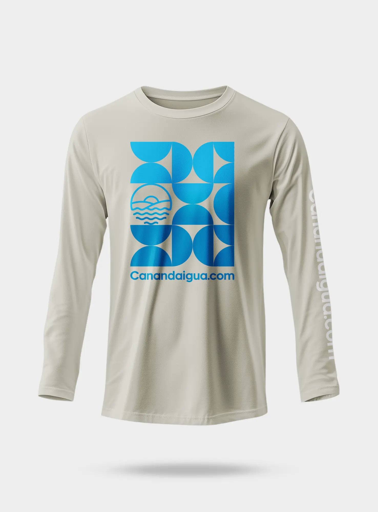 Light gray long sleeve shirt with blue geometric shapes and Canandaigua.com text
