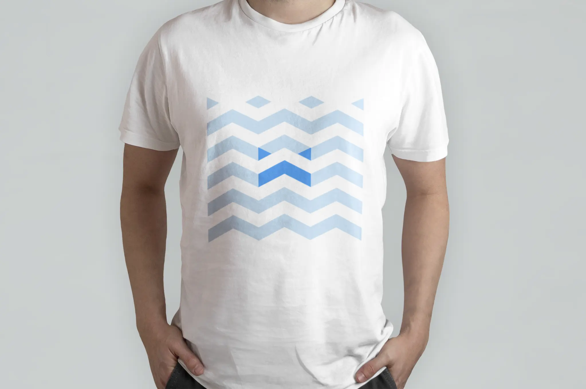 White t-shirt with blue chevron wave pattern and FLX geometric logo design